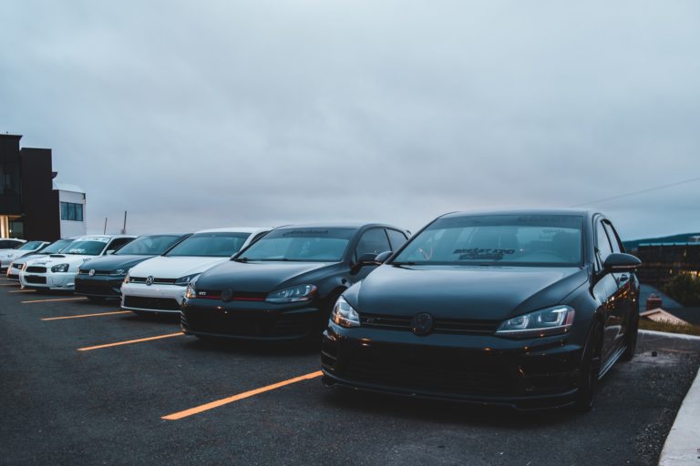 a group of cars in a parking lot