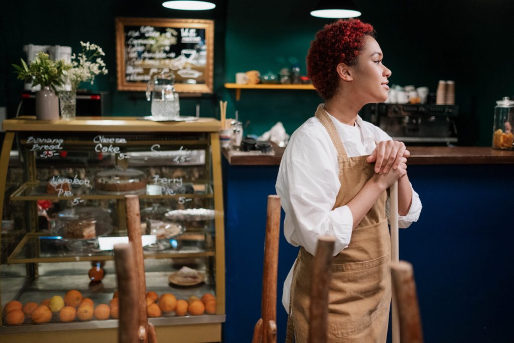 a person standing in a kitchen