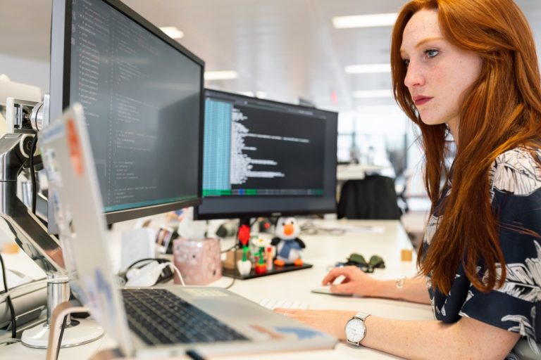 a woman working on a computer