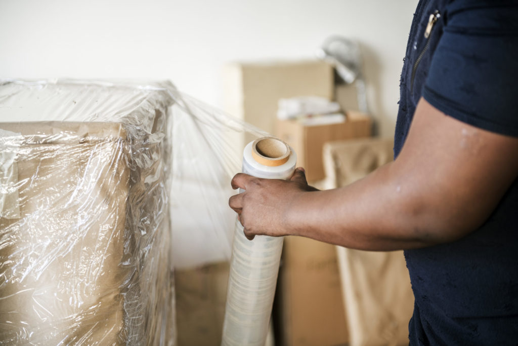 a person holding a white object