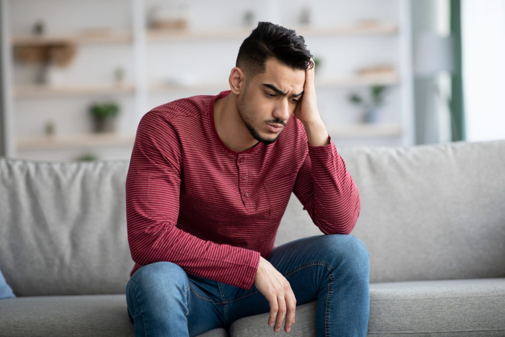 a man sitting on a couch