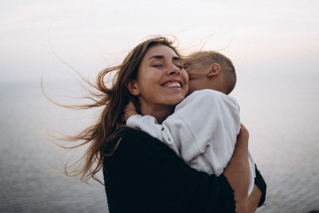 a person holding a baby