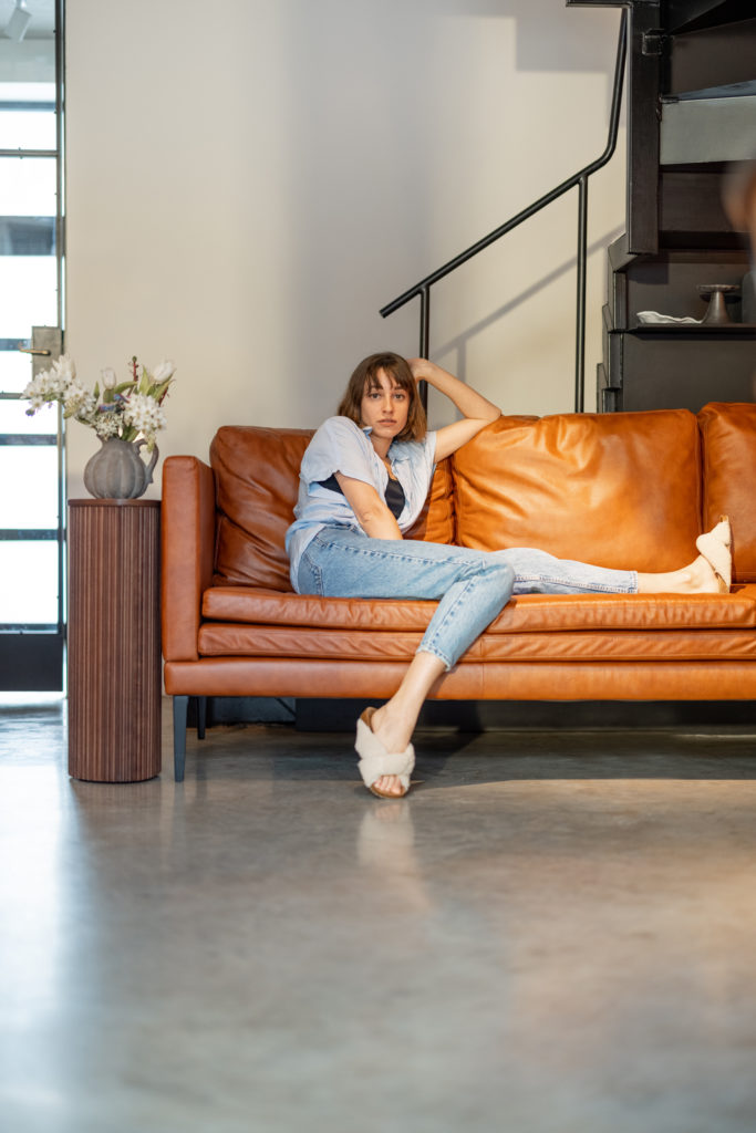 a person sitting on a couch